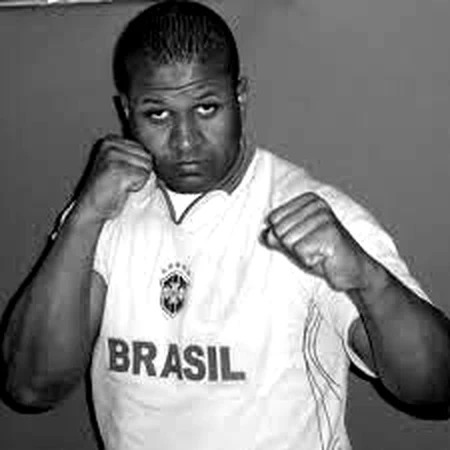 Coach Andre Miguel in a boxing guard